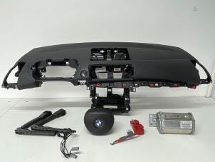 Usados Airbag set + dashboard BMW 1 serie (E81) 118i 16V Precio € 450,00 Norma de margen ofrecido por Het Viaduct