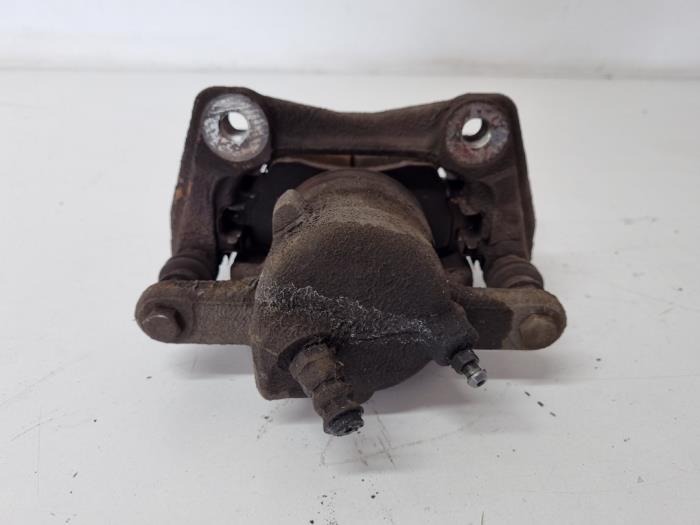 Front brake calliper, left from a Dacia Duster (HS) 1.6 16V LPG 2012