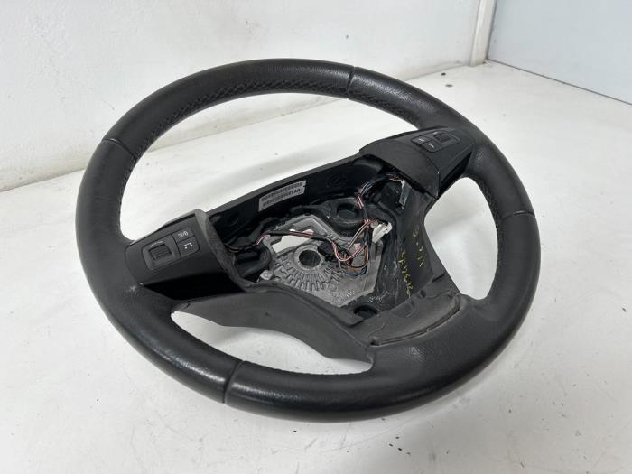 Steering wheel from a Opel Corsa D 1.3 CDTi 16V ecoFLEX 2013