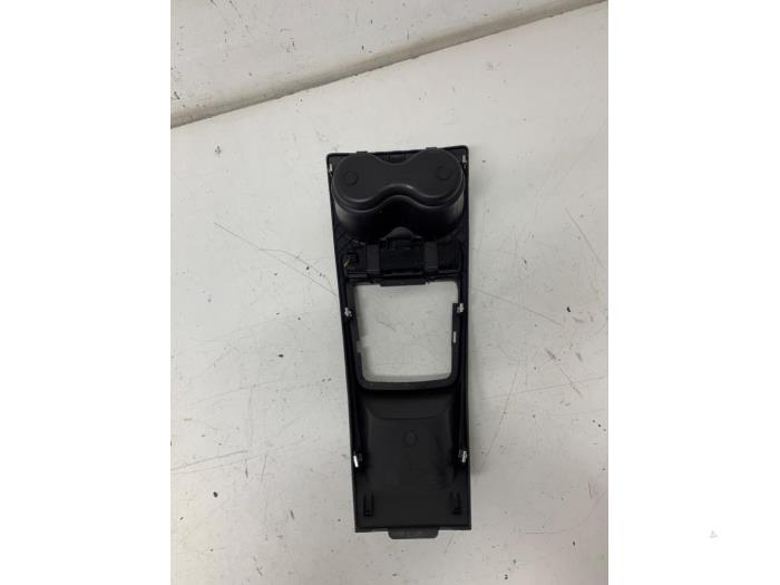 Cup holder from a Seat Ibiza ST (6J8) 1.2 12V 2012