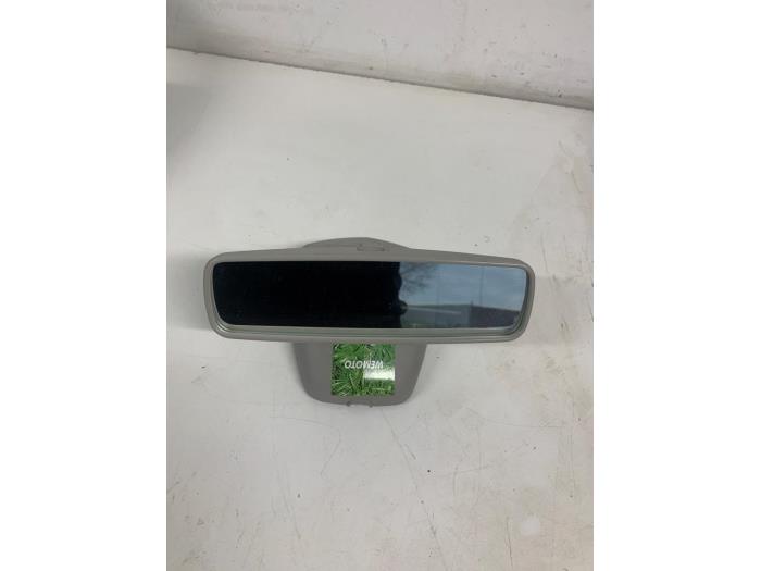 Rear view mirror from a Renault Clio IV (5R) 0.9 Energy TCE 90 12V 2014