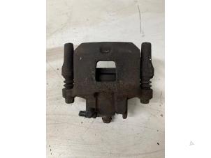 Used Front brake calliper, left Mitsubishi Space Star (A0) 1.2 12V Price € 50,00 Margin scheme offered by Het Viaduct