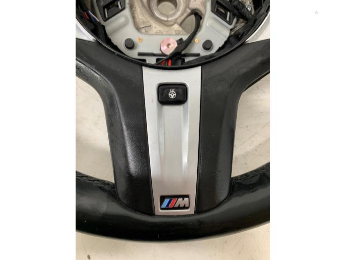 Steering wheel from a BMW 5 serie Touring (G31) 530d xDrive 3.0 TwinPower Turbo 24V 2019