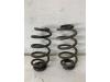 Rear coil spring from a BMW 1 serie (F40) 118d 2.0 16V 2020