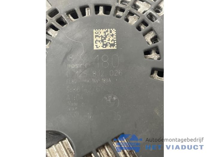 Dynamo van een BMW M1 (F21) M140i 3.0 24V 2016