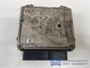 Engine management computer from a Volkswagen Touran (1T1/T2) 1.6 FSI 16V 2003