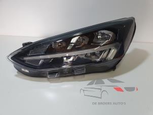 Used Headlight, left Ford Focus 4 1.0 Active EcoBoost 12V Hybrid 125 Price € 400,00 Margin scheme offered by De Broers Auto's