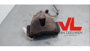 Used Front brake calliper, left Opel Zafira (M75) 1.8 16V Ecotec Price € 20,00 Margin scheme offered by Van Leeuwen Auto Onderdelen