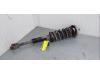 Front shock absorber rod, left from a BMW 5 serie Touring (F11) 520i 16V 2016