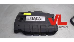 Używane Pokrywa silnika BMW 1 serie (E81) 116i 1.6 16V Cena € 28,00 Procedura marży oferowane przez Van Leeuwen Auto Onderdelen