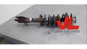 Used Fronts shock absorber, left Daihatsu Cuore (L251/271/276) 1.0 12V DVVT Price € 25,00 Margin scheme offered by Van Leeuwen Auto Onderdelen
