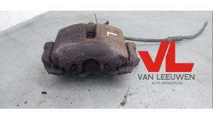 Usagé Etrier de frein avant gauche Volkswagen Touran (1T1/T2) 1.6 FSI 16V Prix € 12,00 Règlement à la marge proposé par Van Leeuwen Auto Onderdelen