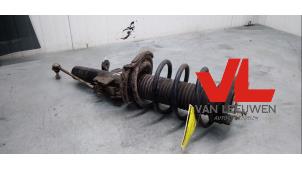 Used Fronts shock absorber, left Ford Focus 3 Wagon 1.0 Ti-VCT EcoBoost 12V 125 Price € 49,50 Margin scheme offered by Van Leeuwen Auto Onderdelen