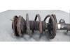 Fronts shock absorber, left from a Toyota Corolla Verso (R10/11) 2.2 D-4D 16V Cat Clean Power 2005