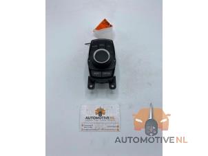 Używane Przycisk I-Drive BMW 1 serie (F20) 116i 1.6 16V Cena € 75,00 Procedura marży oferowane przez AutomotiveNL Oss