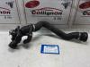 Radiator hose from a BMW 3 serie (E90), 2005 / 2011 320d 16V, Saloon, 4-dr, Diesel, 1,995cc, 120kW (163pk), RWD, M47D20; 204D4; N47D20A; N47D20C, 2004-12 / 2011-10 2005