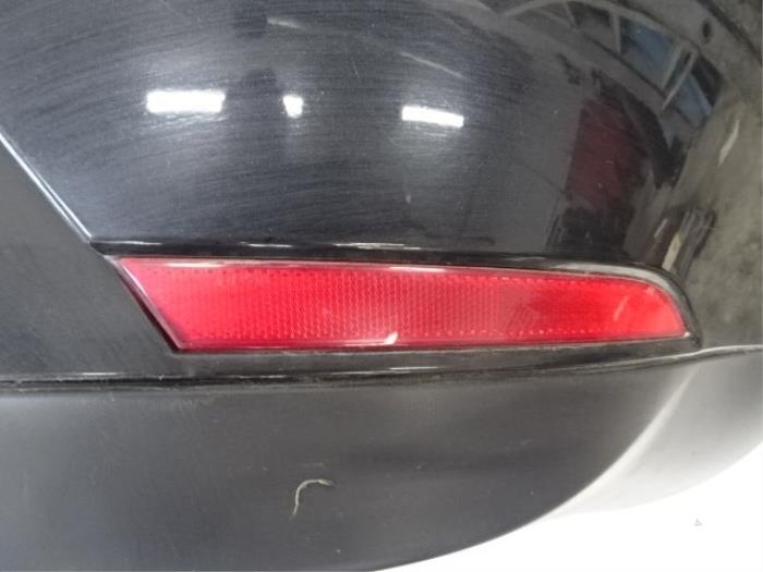 Stoßstangenreflektor rechts hinten van een Seat Ibiza IV SC (6J1) 1.4 TDI 2010