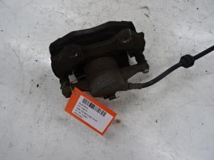 Used Front brake calliper, left Alfa Romeo MiTo (955) 1.3 JTDm 16V Price on request offered by Collignon & Fils
