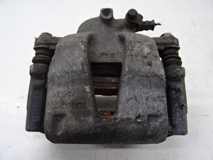 Front brake calliper, left from a Opel Corsa D 1.2 16V 2014