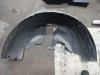 Wheel arch liner from a Volkswagen Scirocco (137/13AD), 2008 / 2017 1.4 TSI 122 16V, Hatchback, 2-dr, Petrol, 1.390cc, 90kW (122pk), FWD, CAXA; CMSB, 2008-08 / 2017-11 2009