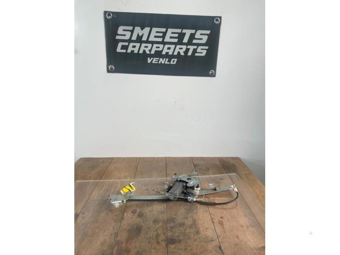Door electric window regulator