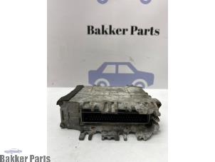 Engine management computer from a Volkswagen Polo III (6N1) 1.0i 50 1998