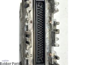 Engine management computer from a Volkswagen Polo III (6N1) 1.0i 50 1998