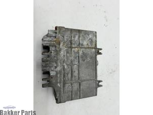 Engine management computer from a Volkswagen Polo III (6N1) 1.0i 50 1998