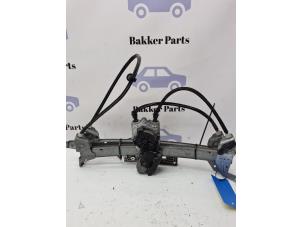 Usagé Lève vitre électrique avant gauche Renault Megane II CC (EM) 1.6 16V Prix € 125,00 Règlement à la marge proposé par Bakker Parts