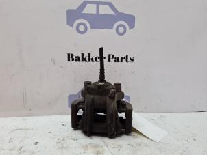 Begagnade Bakre bromsok, vänster BMW 1 serie (F20) 116d 1.6 16V Efficient Dynamics Pris € 50,00 Marginaltabell erbjuds av Bakker Parts