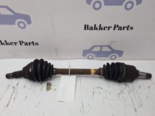 Usados Eje de transmisión izquierda delante Ford Fiesta 5 (JD/JH) 1.4 16V Precio € 30,00 Norma de margen ofrecido por Bakker Parts