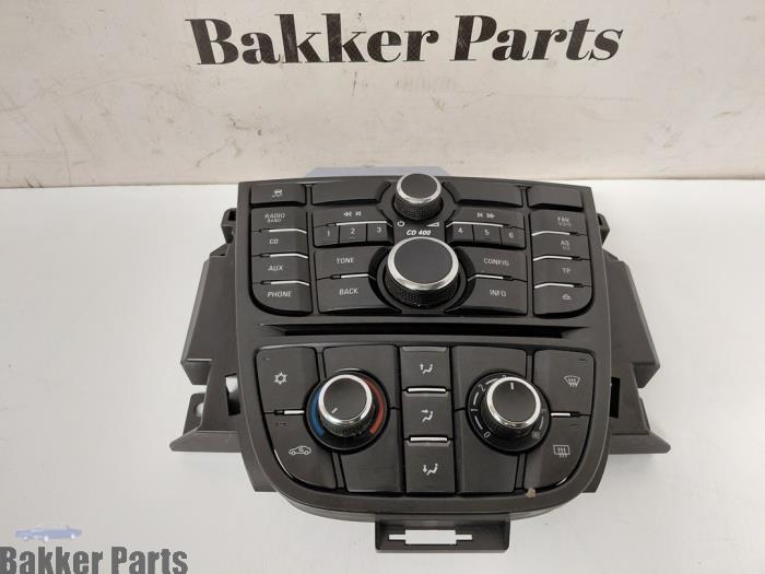 Używane Panel obslugi radia Opel Astra J (PC6/PD6/PE6/PF6) 1.4 Turbo 16V Cena € 90,00 Procedura marży oferowane przez Bakker Parts