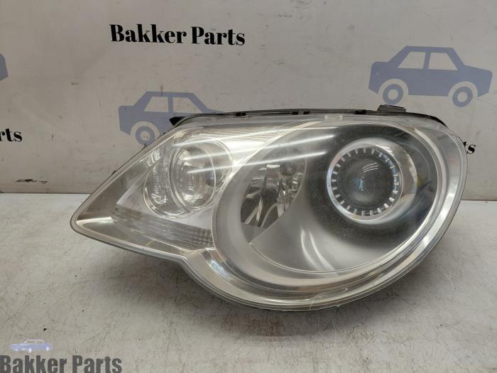 Używane Reflektor lewy Volkswagen Eos (1F7/F8) 2.0 TDI DPF Cena na żądanie oferowane przez Bakker Parts