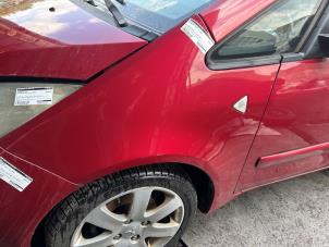 Used Front wing, left Mitsubishi Colt CZC 1.5 16V Price € 45,00 Margin scheme offered by JCR Janssen Car Recycling