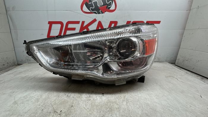 Używane Reflektor lewy Mitsubishi ASX Cena € 181,50 Z VAT oferowane przez Autos Deknudt SA