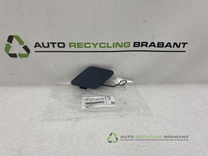 Tow hook cover