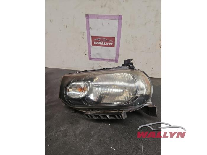 Używane Reflektor lewy Nissan Cube (Z12) 1.5 dCi 110 Cena na żądanie oferowane przez Wallyn COMMV