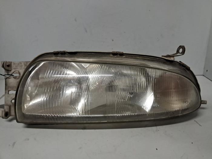 Używane Reflektor lewy Ford Courier (FVJ) Cena € 36,30 Z VAT oferowane przez De Jonghe Recuparts