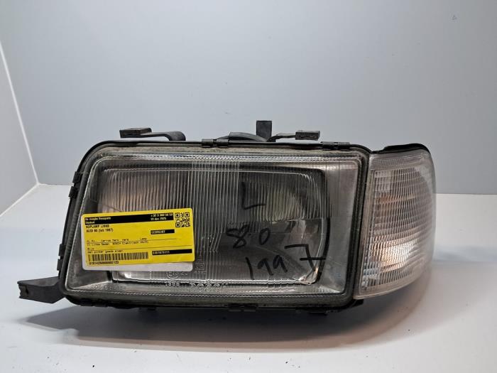Używane Reflektor lewy Audi 80 Cena € 90,75 Z VAT oferowane przez De Jonghe Recuparts