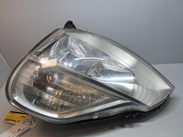 Używane Reflektor lewy Renault Modus/Grand Modus (JP) 1.2 16V GPL Cena € 72,60 Z VAT oferowane przez De Jonghe Recuparts