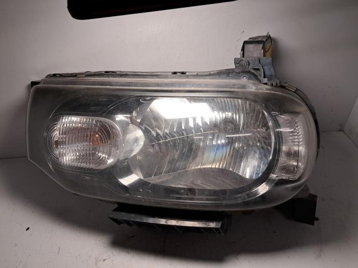 Używane Reflektor lewy Nissan Cube (Z12) 1.6 16V Cena € 151,25 Z VAT oferowane przez De Jonghe Recuparts