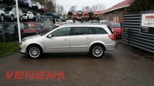 Opel Astra H SW 1.9 CDTi 16V 150 Épave (2006, Métallisé, Gris argenté)