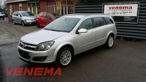 Opel Astra H SW 1.9 CDTi 16V 150 Épave (2006, Métallisé, Gris argenté)
