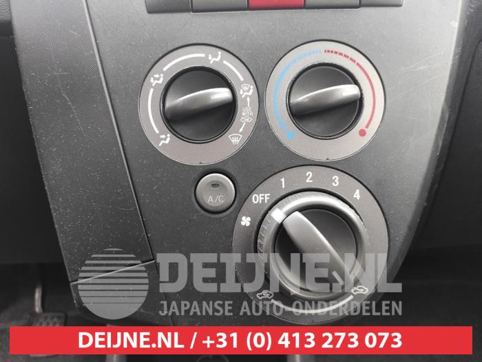 Daihatsu Cuore 1.0 12V DVVT Vehículo de desguace (2007, Rojo)