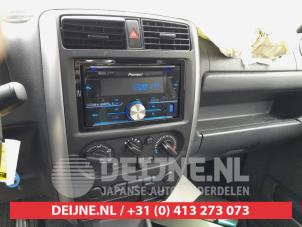 Suzuki Jimny Hardtop 1.3i 16V VVT 4x4 Metal Top Épave (2017, Foncé, Vert)