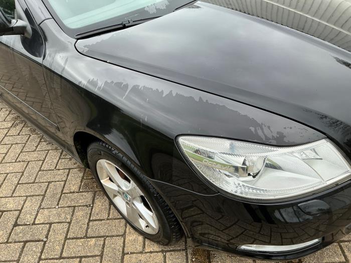 Skoda Octavia Combi 1.2 TSI Schrottauto (2011, Metallic, Schwarz)