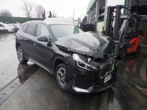 BMW iX1 eDrive20 67 kWh Vehículo de desguace (2025, Negro)