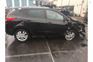 Hyundai iX35 2.0 16V Vehículo de desguace (2011, Negro)