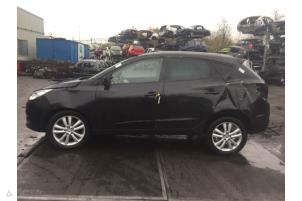 Hyundai iX35 2.0 16V Vehículo de desguace (2011, Negro)