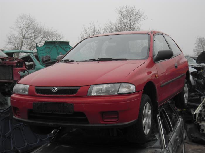 Mazda 323 Salvage vehicle (1997, Red)